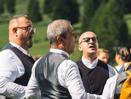 Drei singende Männer