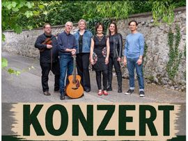 Konzertplakat der Dialektgruppe Findling mit sechs Mitgliedern und Instrumenten für den Auftritt am 9. Oktober 2026 in Trins.